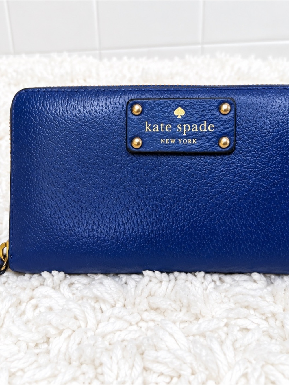 kate spade Deep Blue Pebbled Leather Zip-Around Wallet with Gold Logo